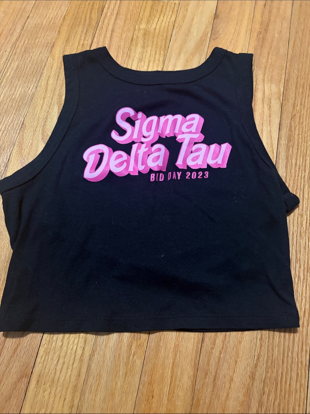 Sigma Delta Tau Black Crop Tank with Pink Lettering